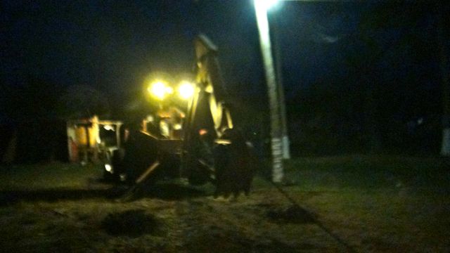 with a backhoe