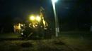 with a backhoe