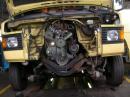 Visiting our yellow home at the mechanic